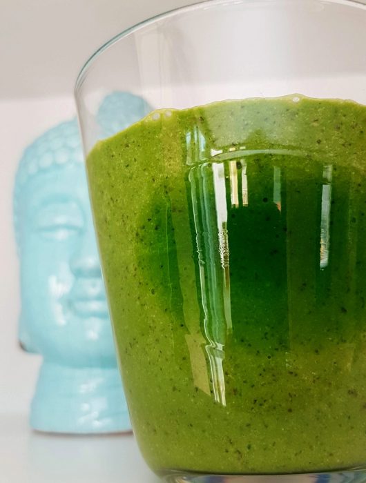 Alcalinizing green juice in a glass