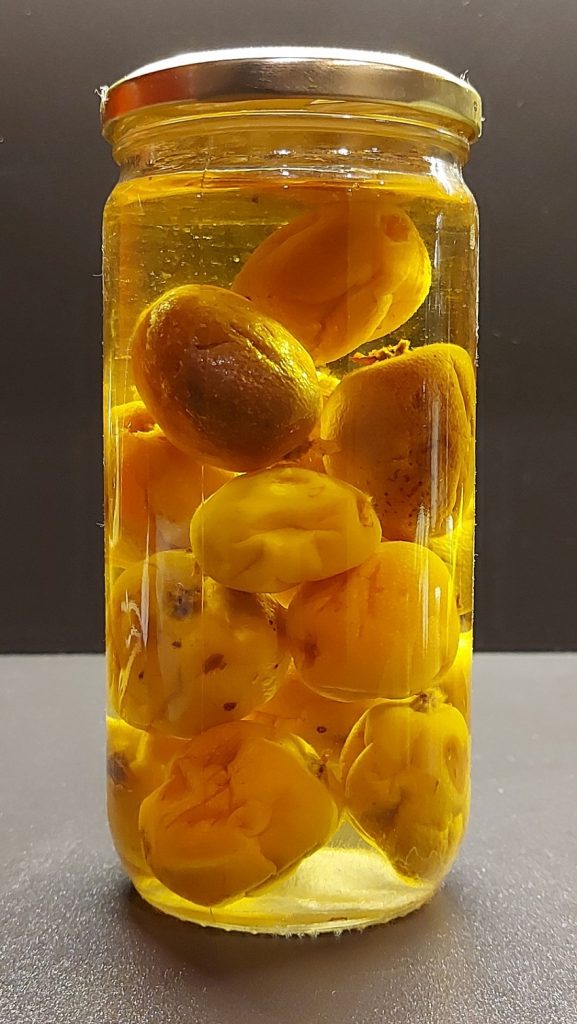 Pickled Loquat fruit in sterilized jar
