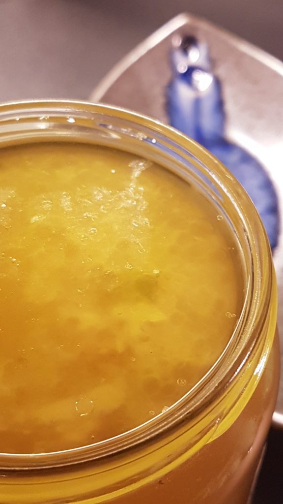 Bone broth filled jar viewed from above