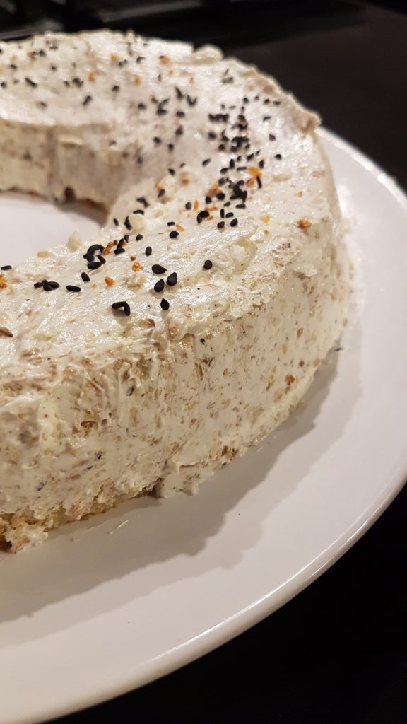 Black sesame chiffon cake with cream icing and black sesame seeds